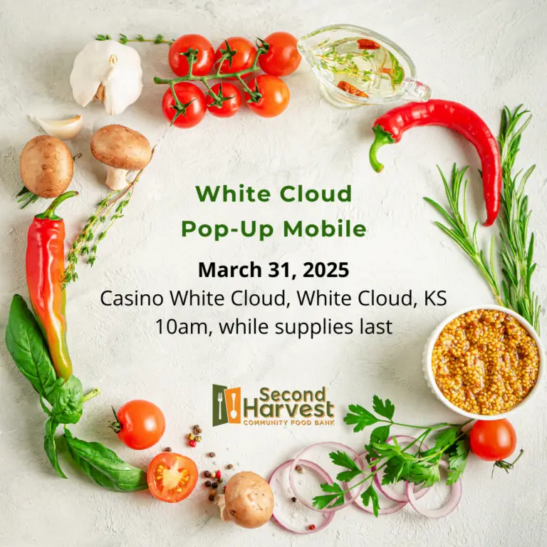 White Cloud Pop-Up Mobile Food Distribution event flyer for March 31, 2025, at Casino White Cloud, Kansas. Features fresh ingredients like tomatoes, garlic, peppers, and herbs arranged in a circular border, with the Second Harvest Community Food Bank logo at the bottom.